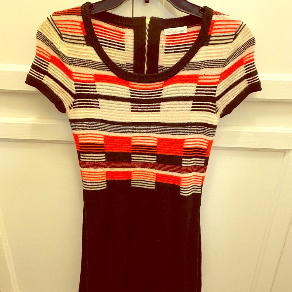 Extra small dress, very cute! Made of wool. Great!